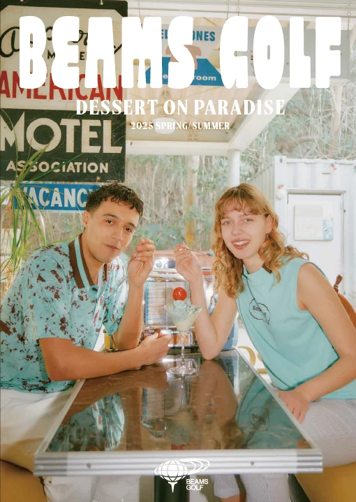 A woman and a man holding golf clubs standing in front of a golf cart